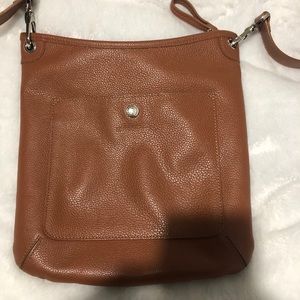 Brown Longchamp Le Foulonne’ crossbody purse.